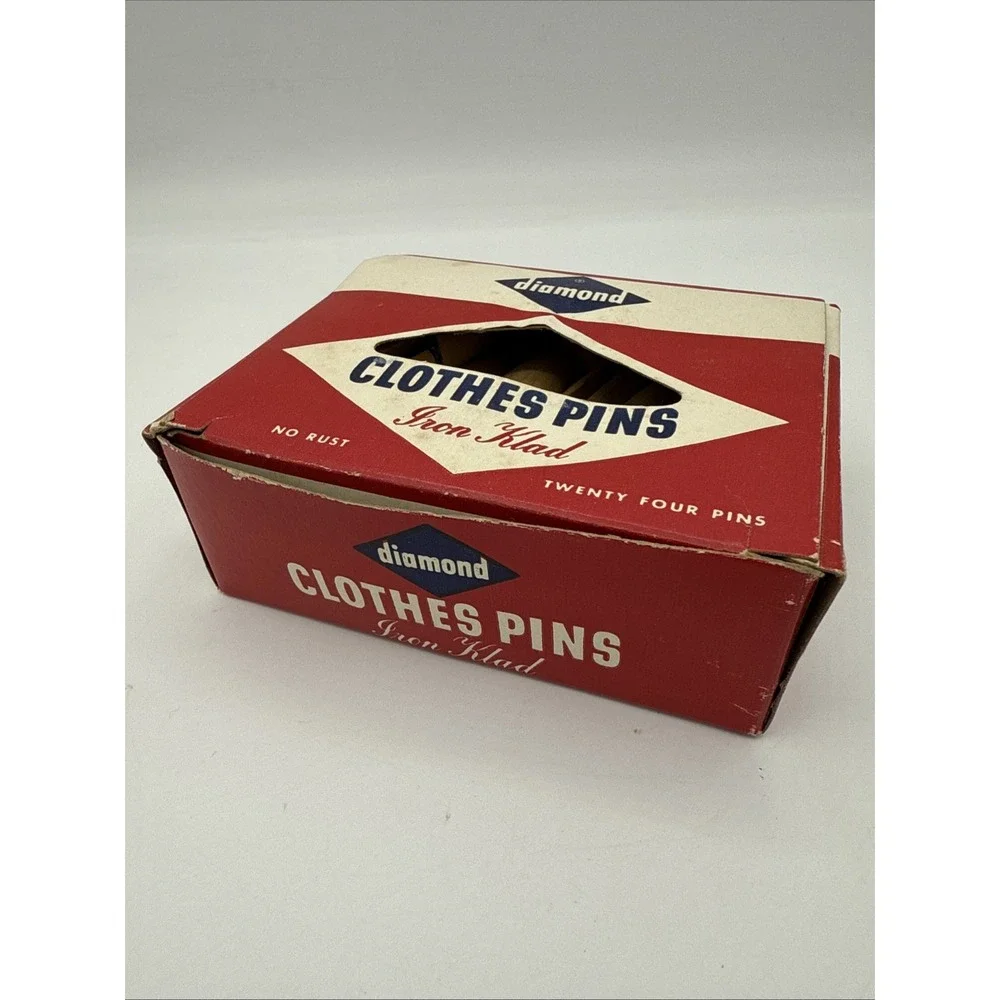 VINTAGE BOX OF WOODEN ROUND SLOTTED CLOTHES PINS BY DIAMOND